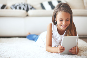Pre teen girl with tablet pc